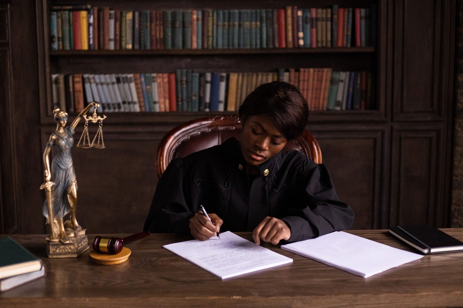 Attorney reviewing case files in a law office